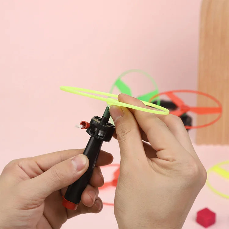 6 pezzi per bambini tirare la corda giocattolo volante elica elicottero giocattoli per bambini all'aperto gioco divertente sport volare Spin Top giocattoli per lo sviluppo dei bambini